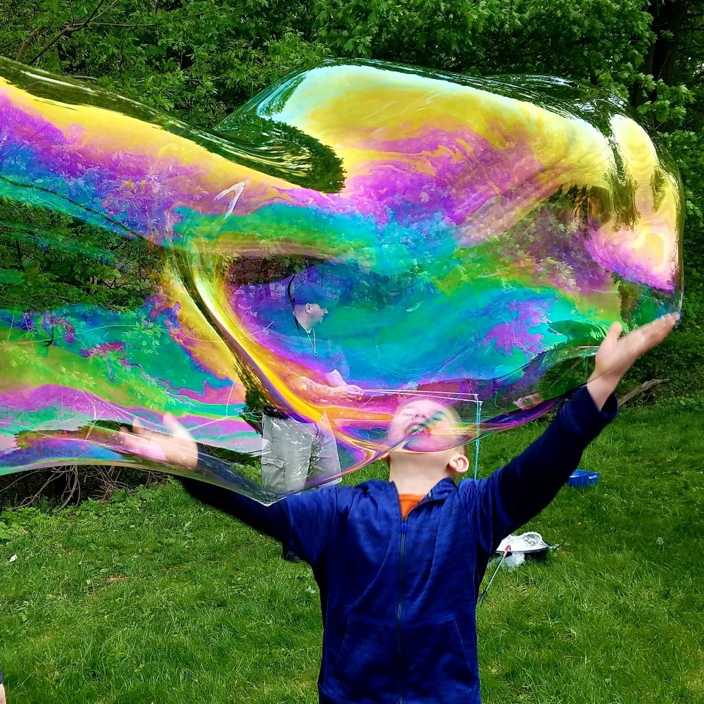 Young girls and boys make GIANT bubbles with @GrandppBubbles at Grandpp Bubbles' "Free Bubble Festivals."