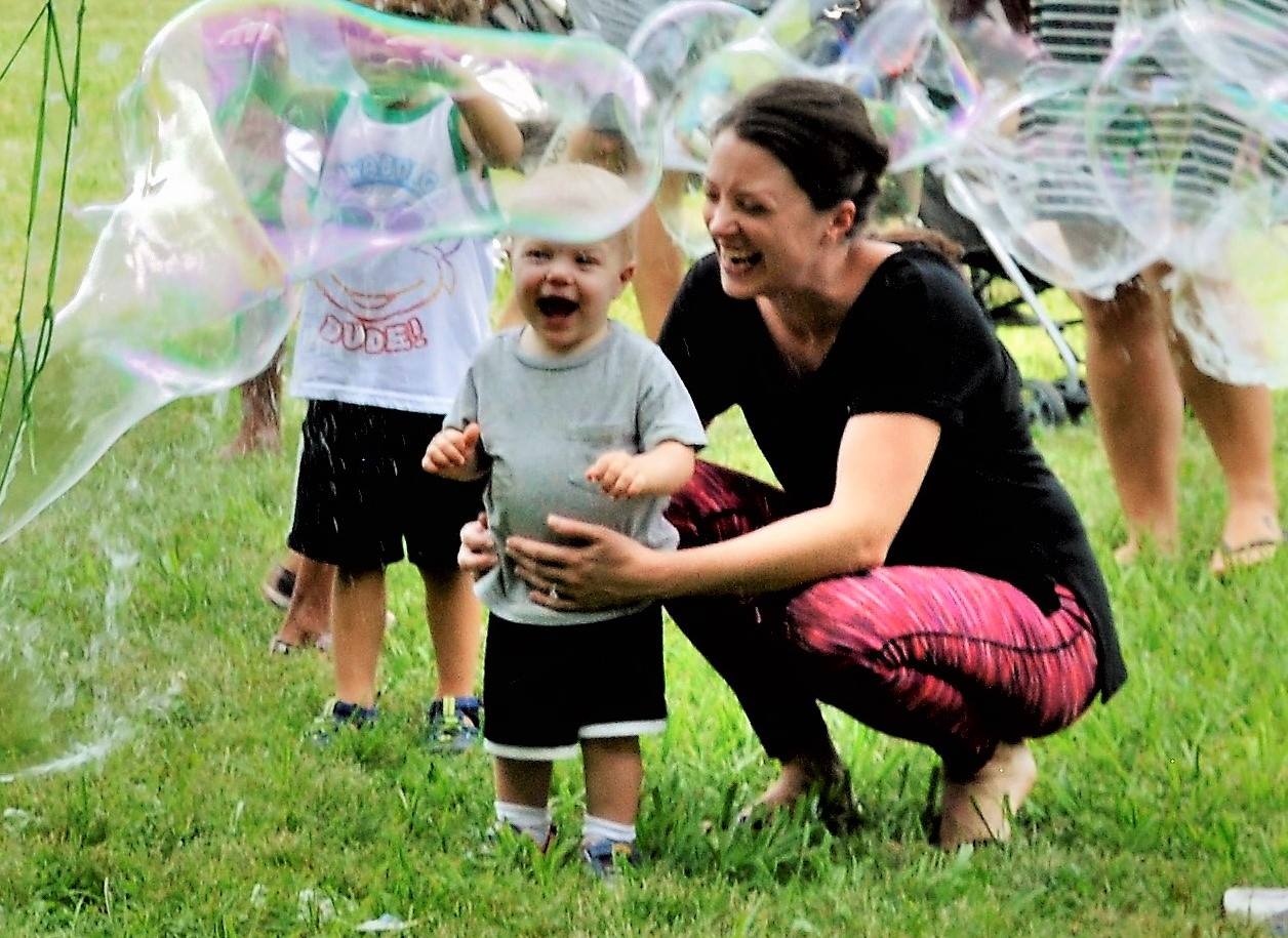 Young girls and boys make GIANT bubbles with @GrandppBubbles at Grandpp Bubbles' "Free Bubble Festivals."