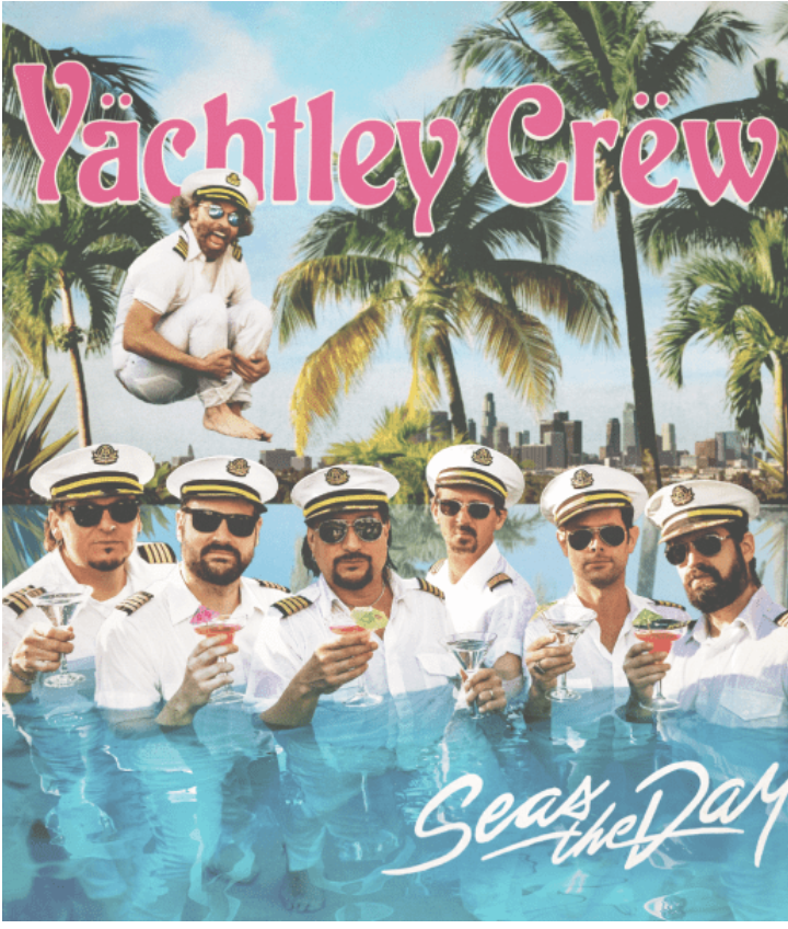 Yachtley Crew in the water with Palm Trees in background