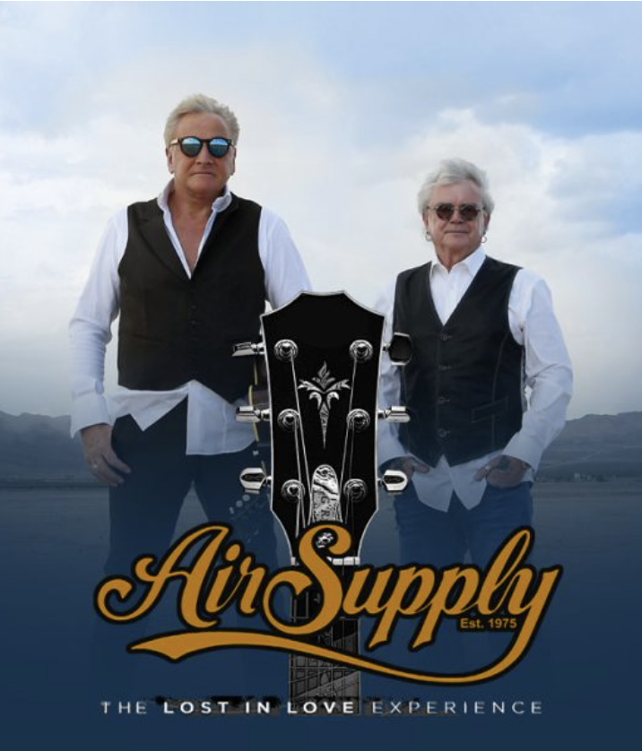 Air Supply posing with logo