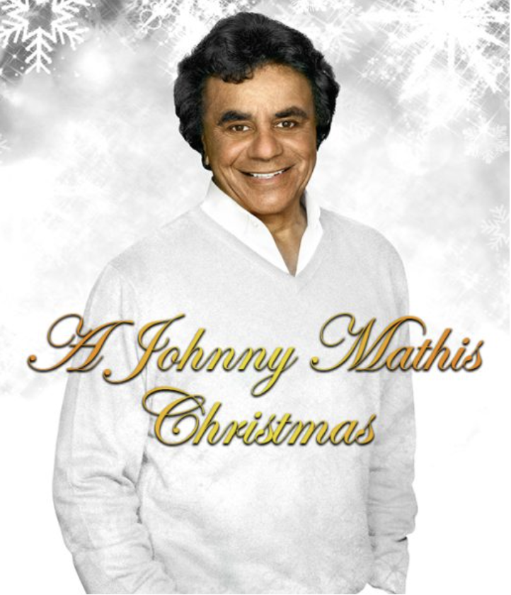 Johnny Mathis in white