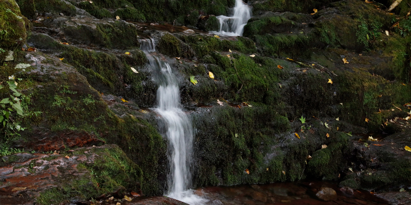  A lighter stream of water trickling down a staircase of rocks at Buttermilk, one of the popular waterfalls in New Jersey.