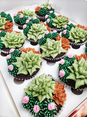 cupcakes in tray decorated to look like succulents