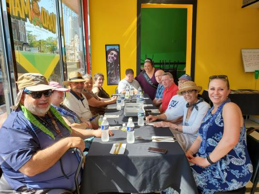 Jamaican Restaurant and Group of People