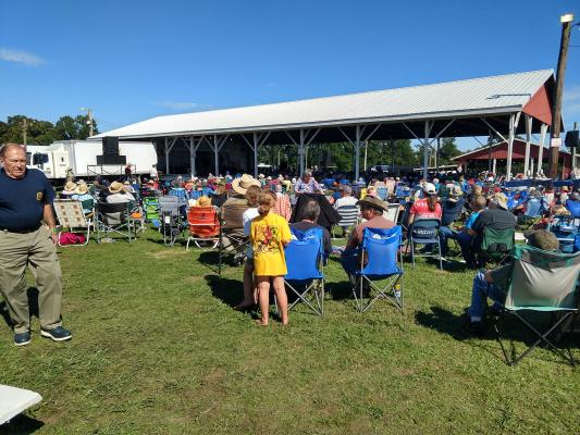 Crowd viewing the stage in the afternoon