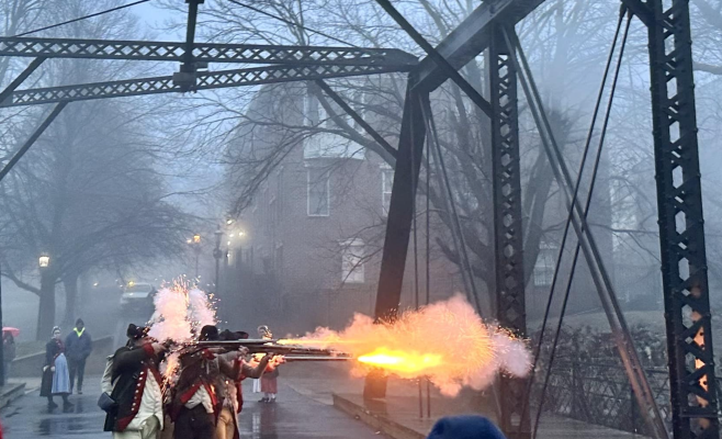 soldiers firing across lines at dusk