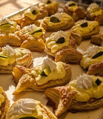 fish shaped pastries with lemon curd on top