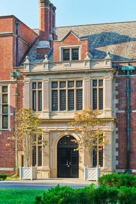 main entrance of brick and stone mansion