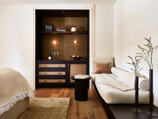 interior room with shelves and hardwood floors