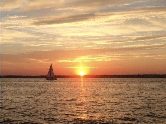 sunset with boat to side