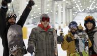 Snowboarders cheering